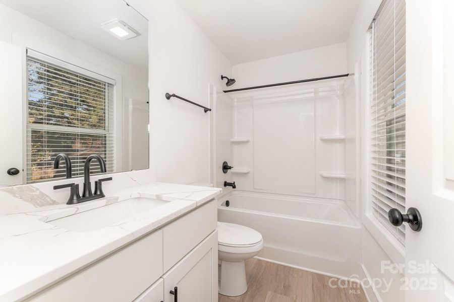 Furnished interior view inside a new home in , Statesville (Image 6).