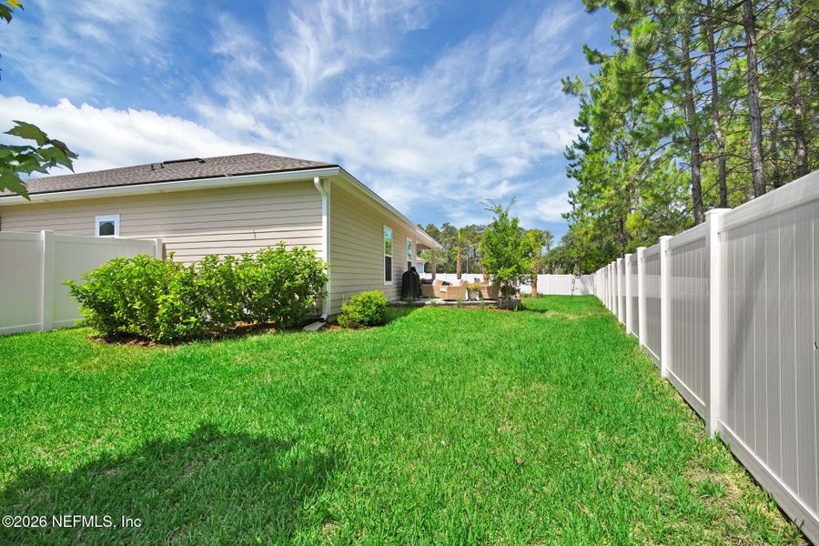Exterior details and patio area of a home in , Yulee (Image 34).