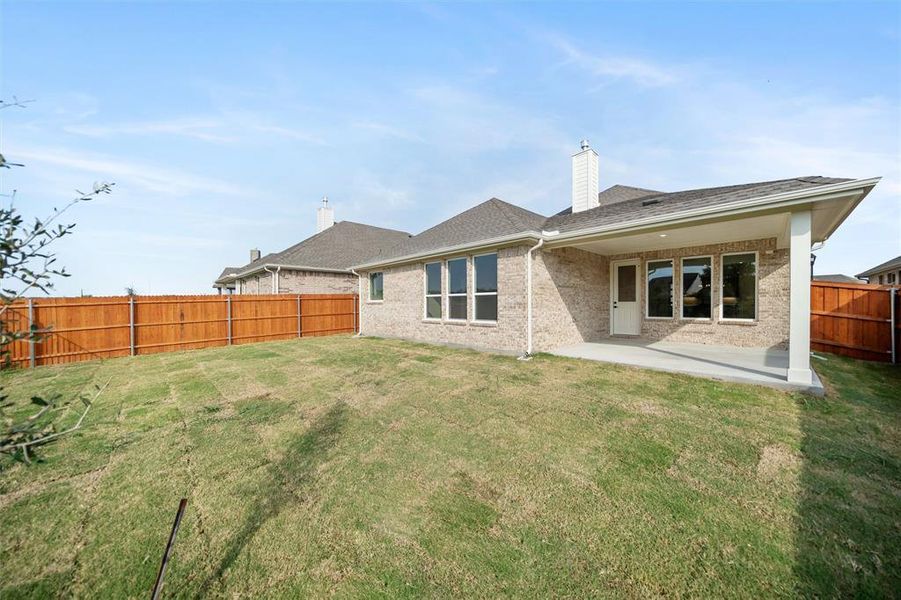 Exterior details and patio area of a home in Morningstar, Aledo (Image 3). Exterior details and patio area of a home in Morningstar, Aledo (Image 3).