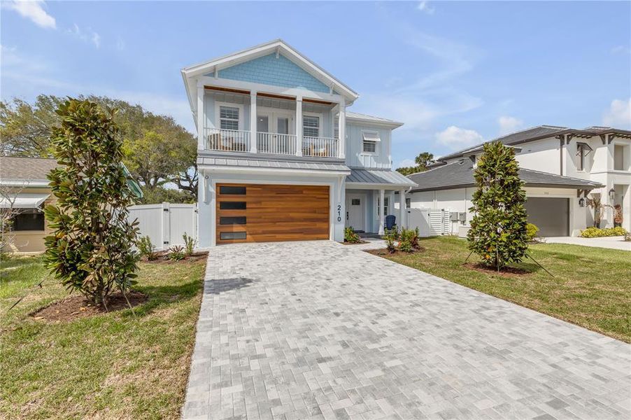 Front exterior of a new home in , New Smyrna Beach, FL, highlighting curb appeal (Image 30).