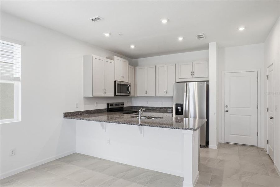 Furnished interior view inside a new home in , Orlando (Image 4).