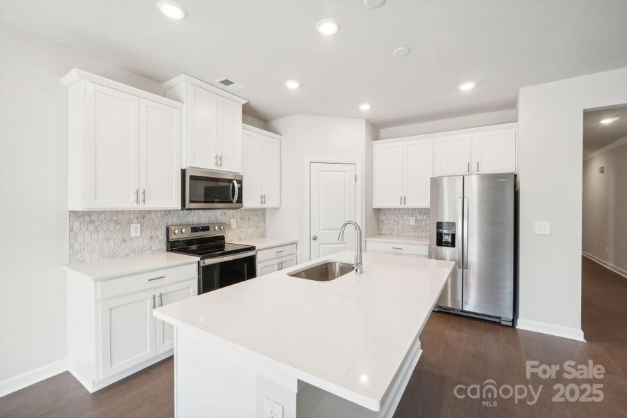 Furnished interior view inside a new home in Harper Landing, Stanley (Image 8).