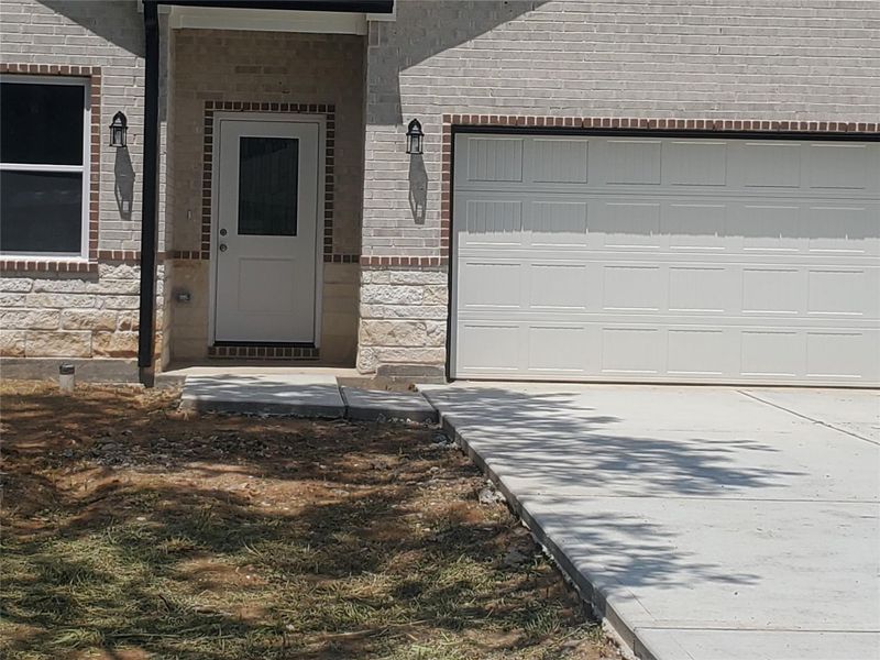 Front exterior of a new home in , Texas City, TX, highlighting curb appeal (Image 15). Front exterior of a new home in , Texas City, TX, highlighting curb appeal (Image 15).