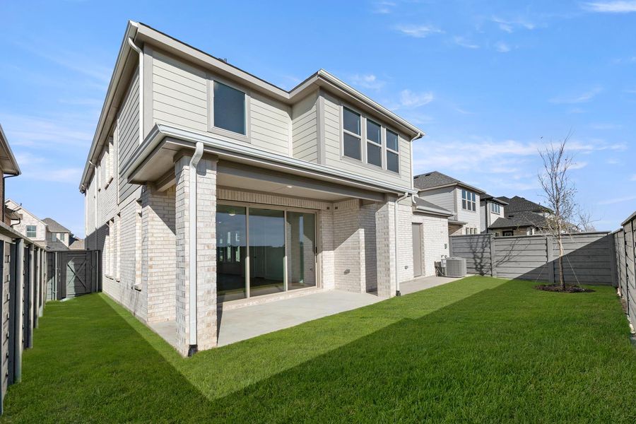 Exterior details and patio area of a home in Union Park, Little Elm (Image 3).