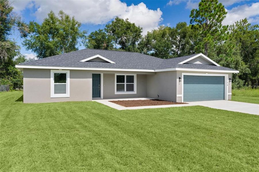 Front exterior of a new home in , Ocklawaha, FL, highlighting curb appeal (Image 17).