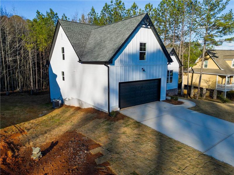 Front exterior of a new home in , Villa Rica, GA, highlighting curb appeal (Image 23).