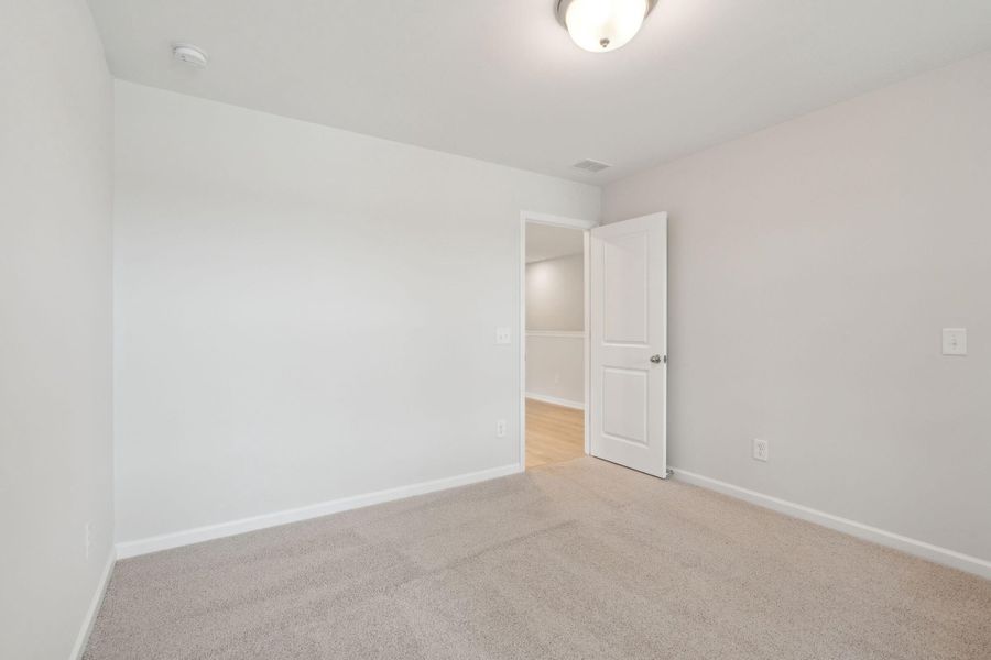 Spacious, unfurnished interior of a new home in Miller's Crossing, Johns Island (Image 22).