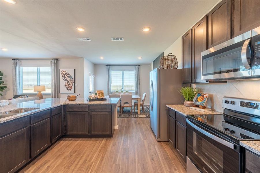 Furnished interior view inside a new home in Retreat at Fossil Creek, Fort Worth (Image 10).