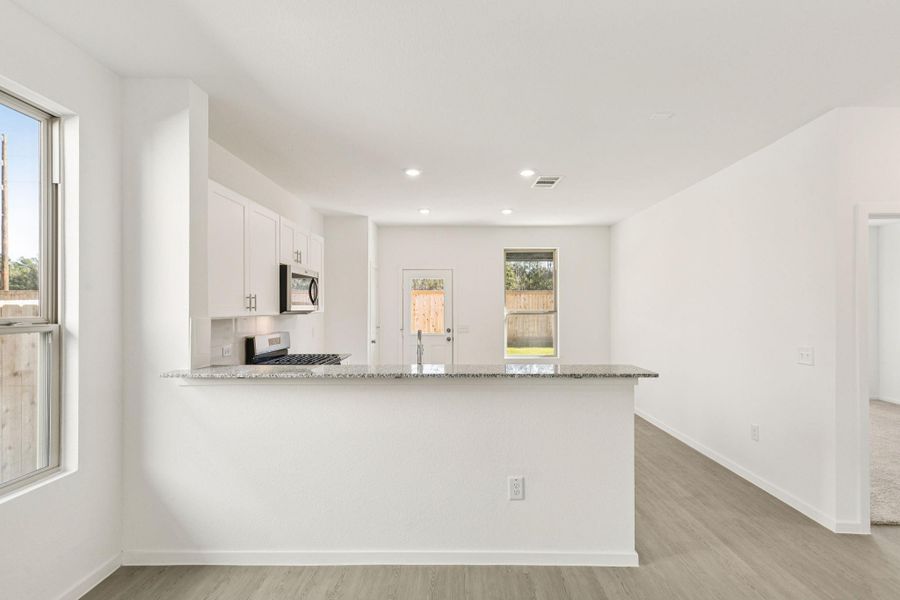 Furnished interior view inside a new home in Mavera, Conroe (Image 10).