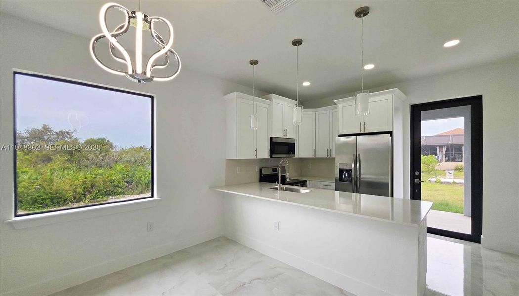 Furnished interior view inside a new home in , Lehigh Acres (Image 11).