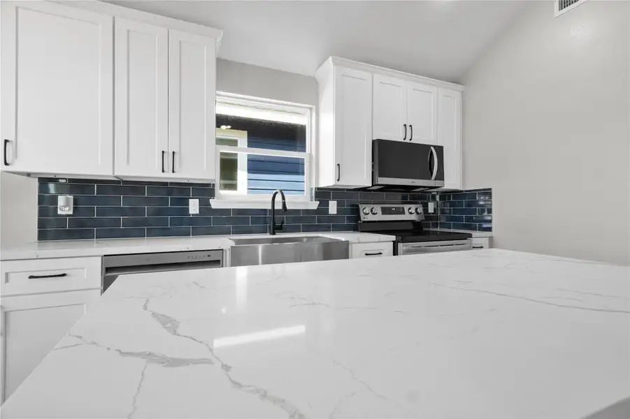 Furnished interior view inside a new home in , San Leon (Image 6).