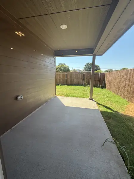 Exterior details and patio area of a home in Craftsman's Corner, Cleburne (Image 4). Exterior details and patio area of a home in Craftsman's Corner, Cleburne (Image 4).