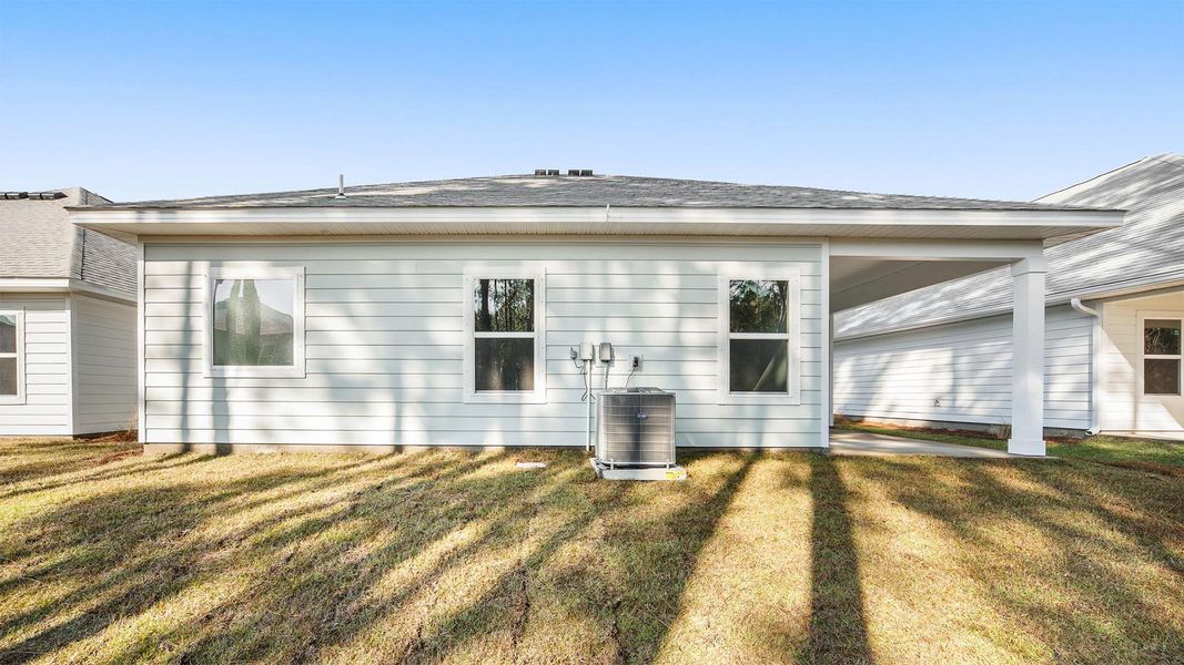 Exterior details and patio area of a home in Bayside at Ward Creek, Panama City Beach (Image 4).