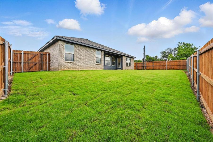 Front exterior of a new home in Trail Creek, Cleburne, TX, highlighting curb appeal (Image 1). Front exterior of a new home in Trail Creek, Cleburne, TX, highlighting curb appeal (Image 1).