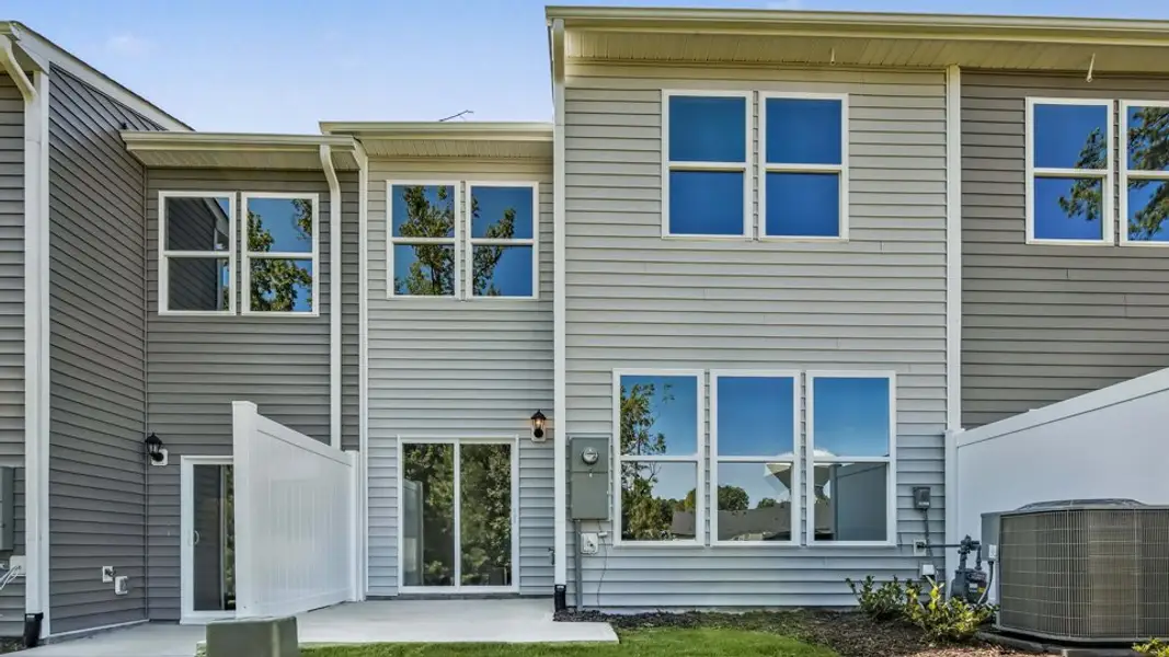 Exterior details and patio area of a home in Chapel Townes, Raleigh (Image 29).