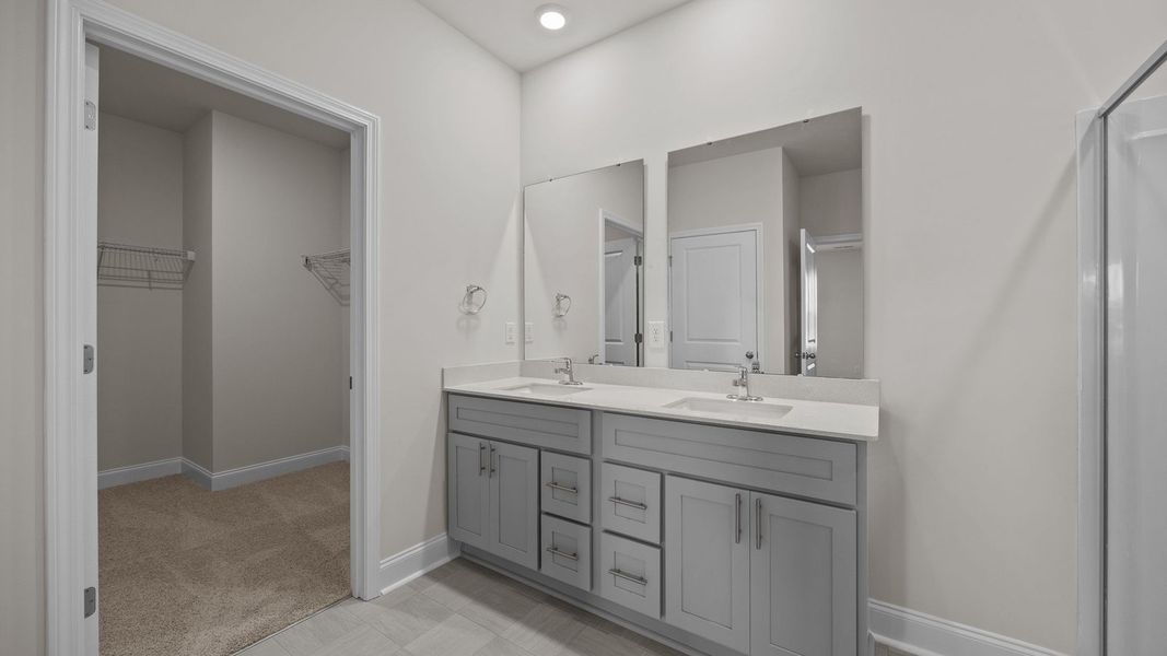 Furnished interior view inside a new home in Beaver Dam Crossing, Bailey (Image 9). Furnished interior view inside a new home in Beaver Dam Crossing, Bailey (Image 9).