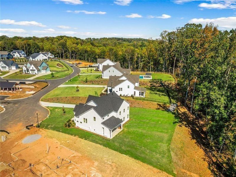 Aerial view of the Long Hollow Landing community in Gainesville, GA, showing layout and nearby surroundings (Image 1). Aerial view of the Long Hollow Landing community in Gainesville, GA, showing layout and nearby surroundings (Image 1).