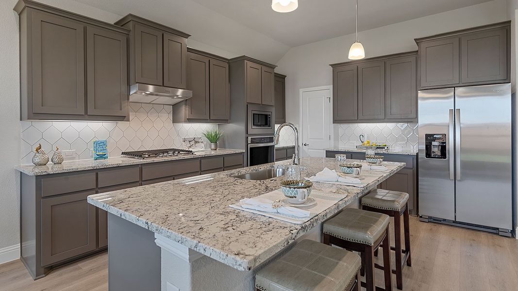 Representative furnished interior of a home built from the Guadalupe by D.R. Horton in Eden Ranch, Arlington (Image 6).