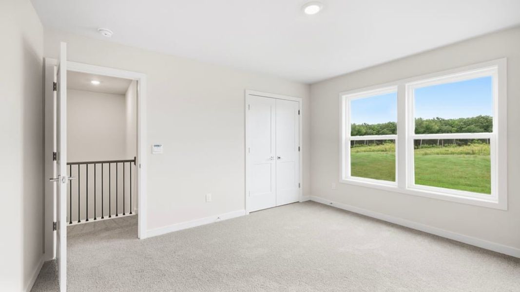 Spacious, unfurnished interior of a new home in Adams Glen, Greenville (Image 35).