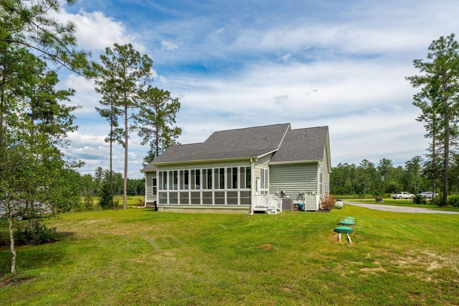 Front exterior of a new home in , Huger, SC, highlighting curb appeal (Image 21).