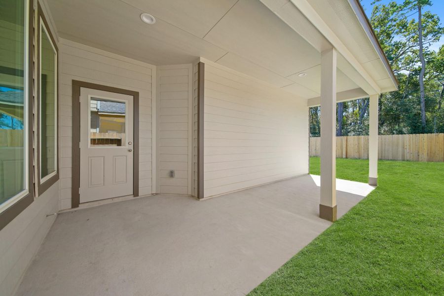 Exterior details and patio area of a home in Cypresswood Landing, Humble (Image 3).