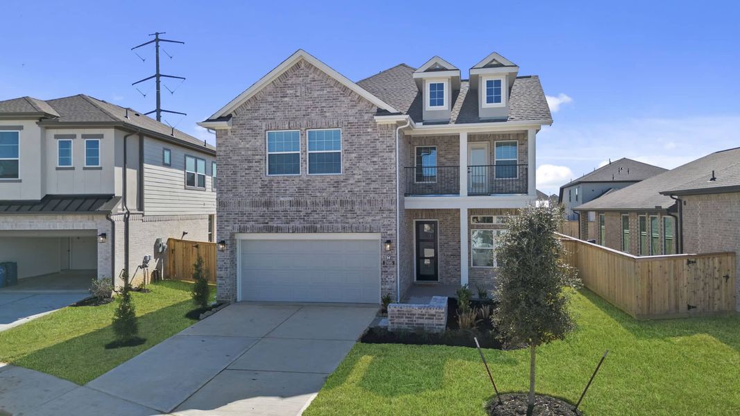 Front exterior of a new home in Bridgeland, Cypress, TX, highlighting curb appeal (Image 21). Front exterior of a new home in Bridgeland, Cypress, TX, highlighting curb appeal (Image 21).