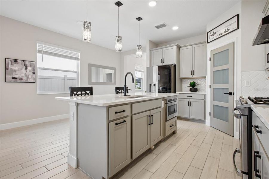 Furnished interior view inside a new home in Emerson Pointe, Apopka (Image 6). Furnished interior view inside a new home in Emerson Pointe, Apopka (Image 6).