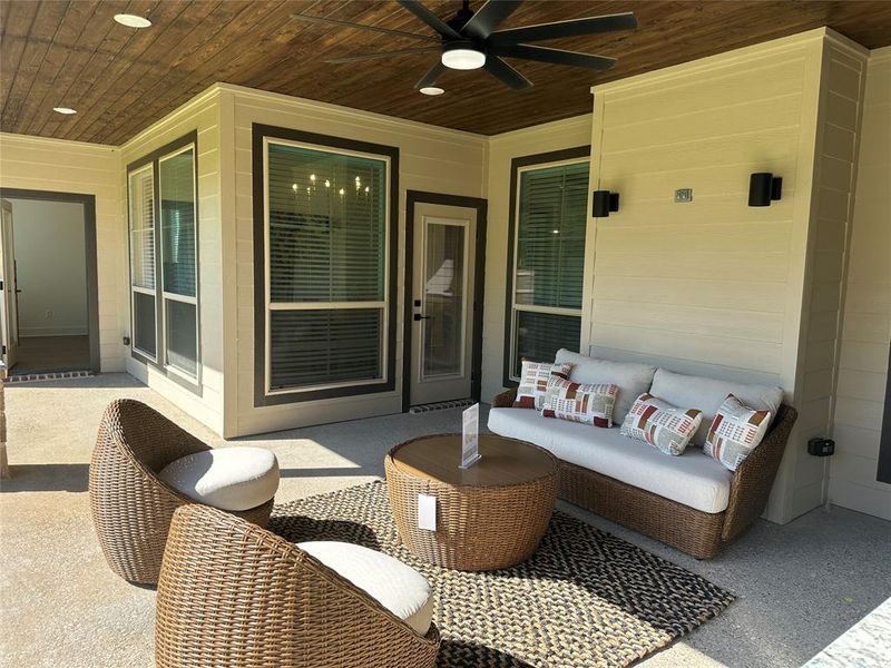 Covered patio featuring a wood-finish ceiling, recessed lighting, and a modern ceiling fan