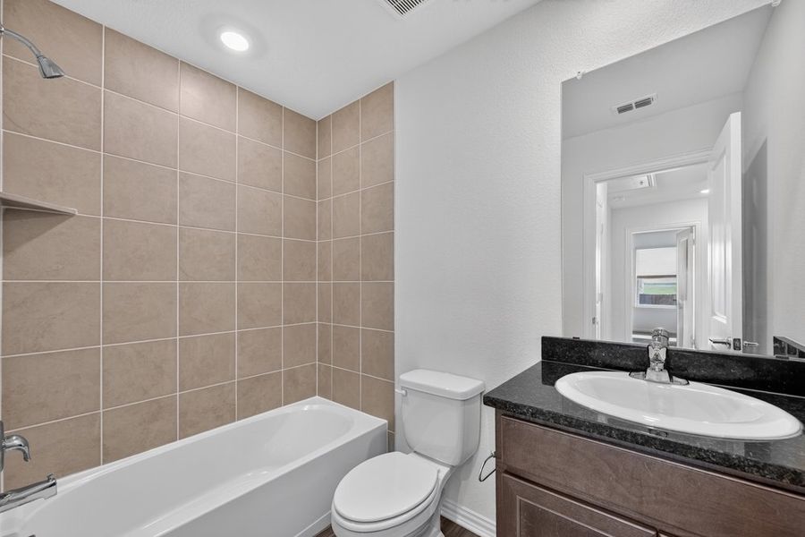 Furnished interior view inside a new home in River Ridge, Crandall (Image 9).