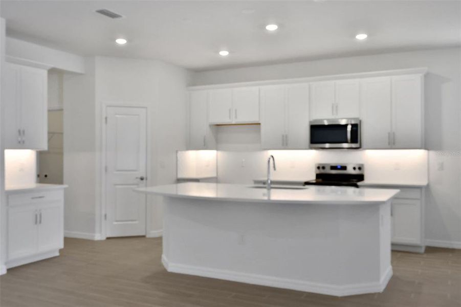 Furnished interior view inside a new home in Angeline, Land O' Lakes (Image 11).