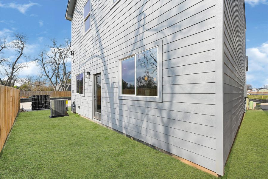 Exterior details and patio area of a home in , Houston (Image 4).