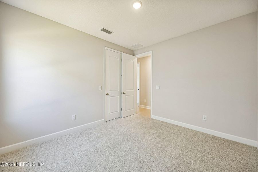 Spacious, unfurnished interior of a new home in Sandy Ridge, Yulee (Image 19).