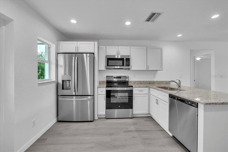 Furnished interior view inside a new home in , Punta Gorda (Image 7).