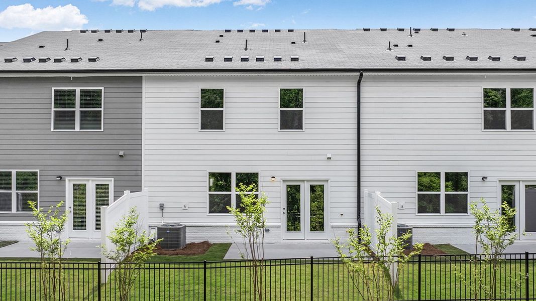 Exterior details and patio area of a home in Echo Glen, Stockbridge (Image 2).