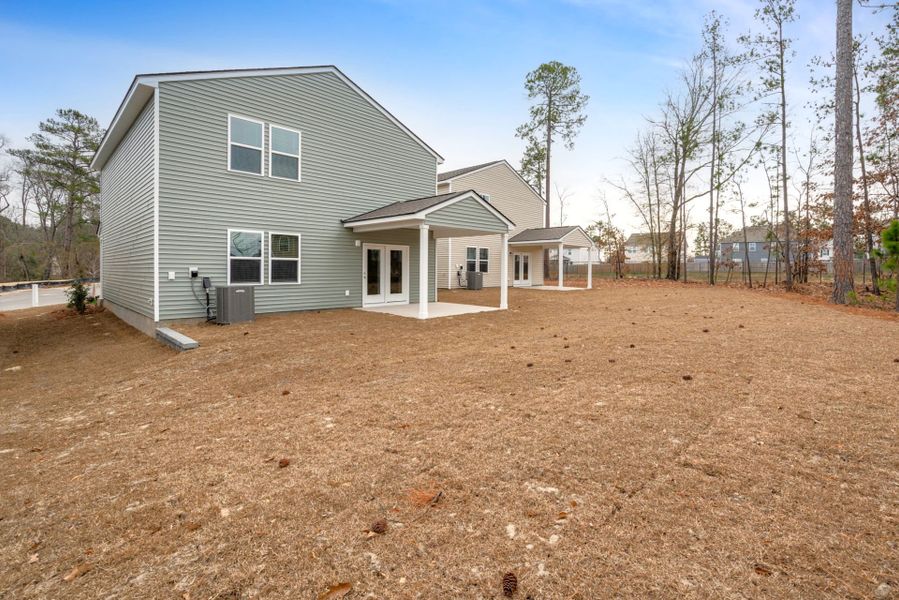 Exterior details and patio area of a home in Grand Arbor, Blythewood (Image 4).