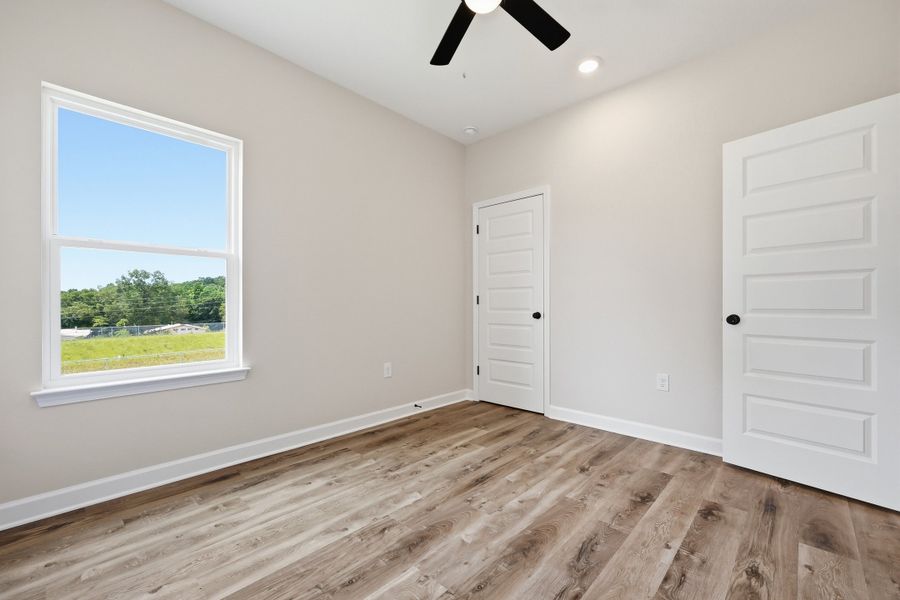 Spacious, unfurnished interior of a new home in Southern Charm, Crestview (Image 32). Spacious, unfurnished interior of a new home in Southern Charm, Crestview (Image 32).