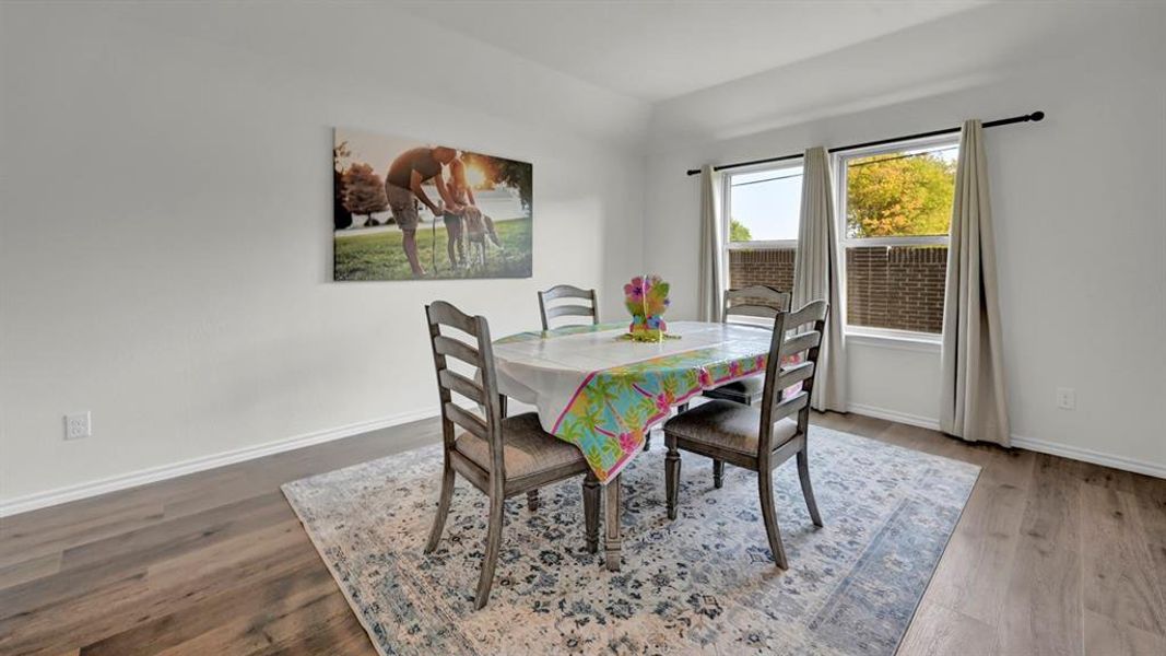 Dining room featuring wood finished floors