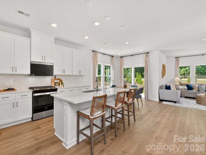 Photo is not of the actual home, but is an inspirational photo of builder’s model home and may depict options, furnishings, and/or decorator features that are not included