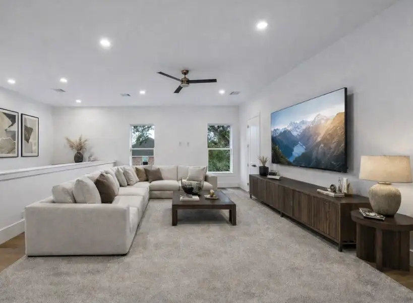 Virtually staged game room upstairs