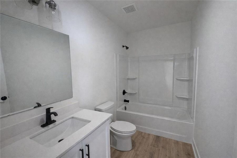 Furnished interior view inside a new home in , Suwanee (Image 8). Furnished interior view inside a new home in , Suwanee (Image 8).