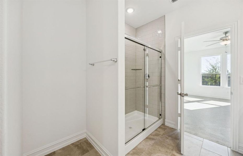 Modern owner's bathroom with spacious shower