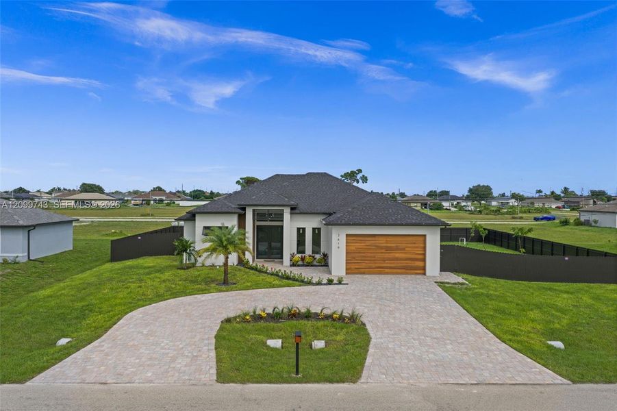 Front exterior of a new home in , Cape Coral, FL, highlighting curb appeal (Image 25).
