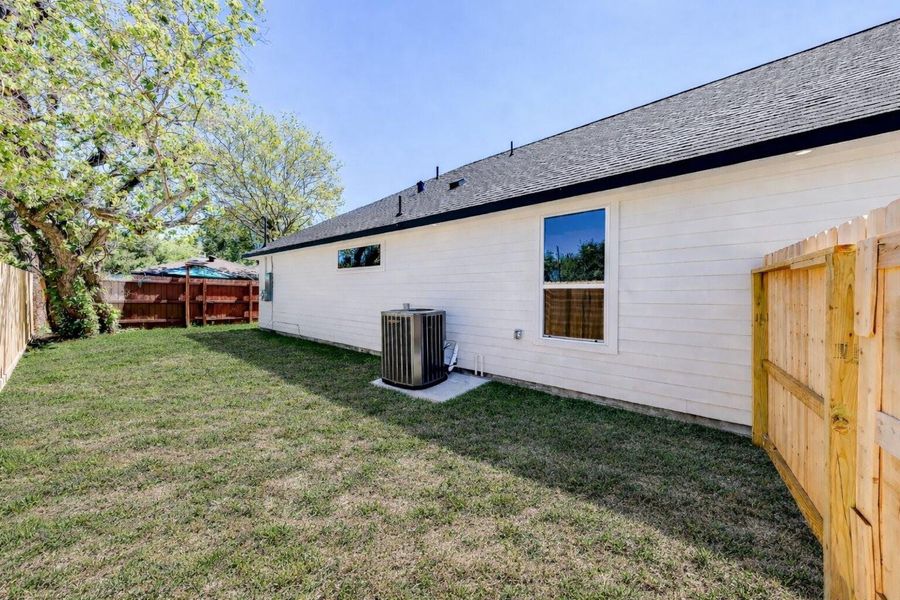 Exterior details and patio area of a home in , Baytown (Image 24).