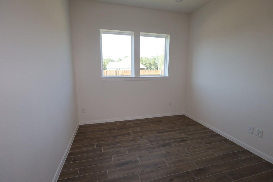 Spacious, unfurnished interior of a new home in Sundance Cove Lakeside - Overlook View Collection, Crosby (Image 9).