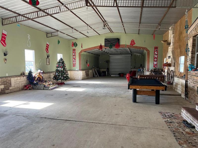 Garage featuring a carport