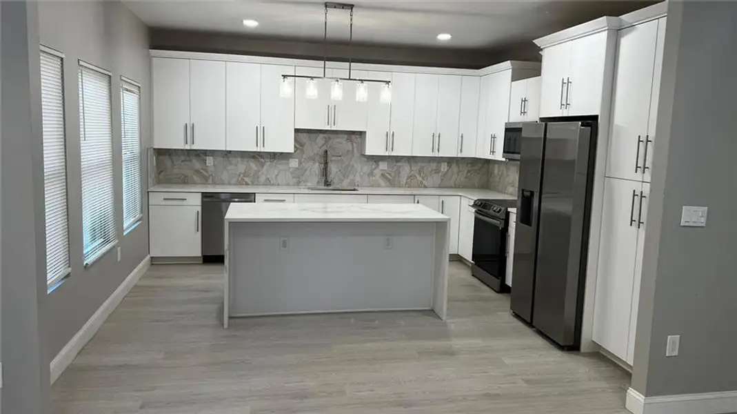 Furnished interior view inside a new home in , Riverdale (Image 5).