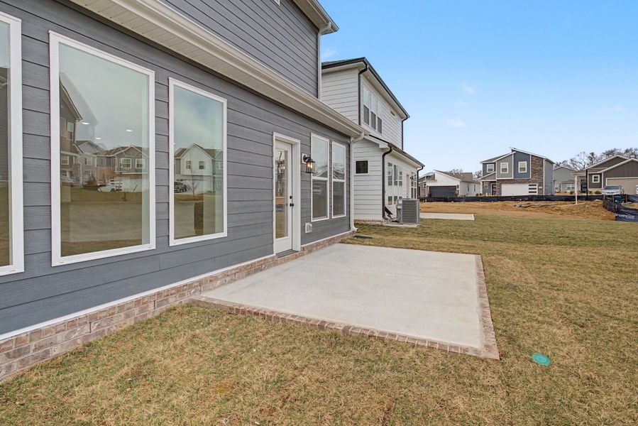 Exterior details and patio area of a home in Nexus – Park Collection, Gallatin (Image 26).