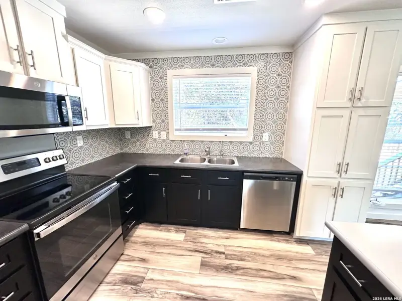 Furnished interior view inside a new home in , Lakehills (Image 27).