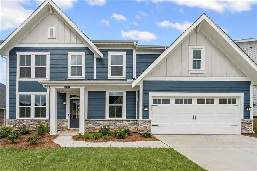 Front exterior of a new home in Twin Lakes, Hoschton, GA, highlighting curb appeal (Image 24).