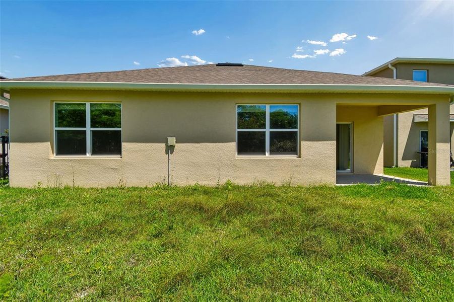 Exterior details and patio area of a home in Riviera Bella, Debary (Image 4).